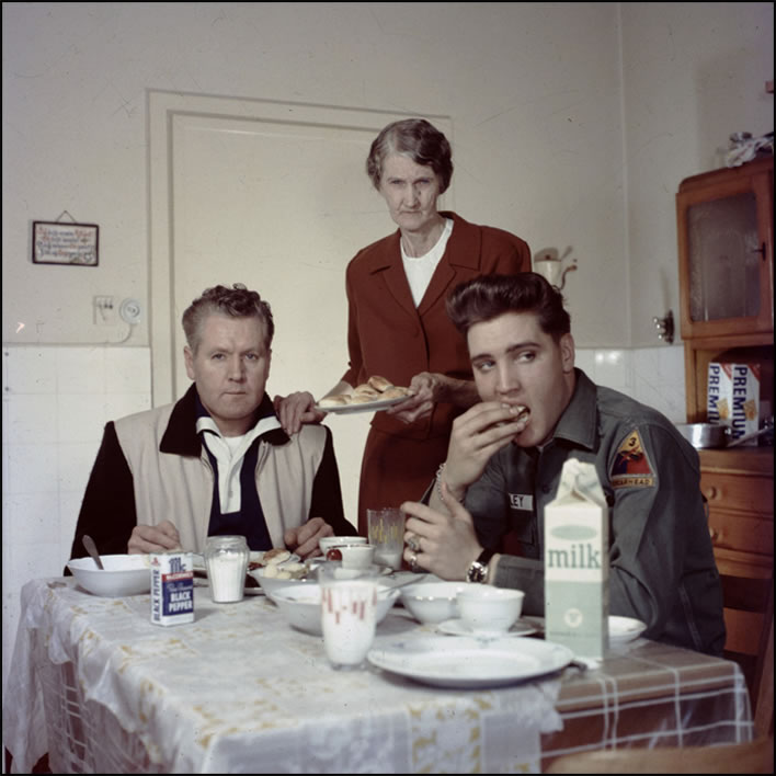 Minnie Mae, center, serves her son, Vernon, and her grandson, Elvis, who at the time was both a superstar and a member of the U.S. Army, in Germany.